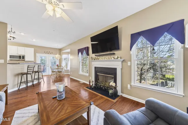 a kitchen with stainless steel appliances a sink stove and cabinets