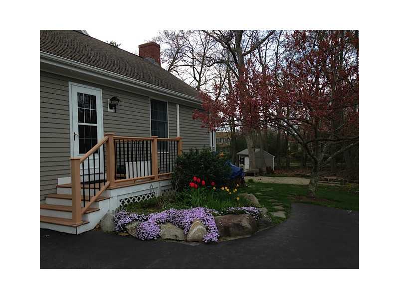 22 Great Road Barrington, RI 02806 - Photo 21 of 23 Exterior Front. 2 car garage and entry mudroom with first floor laundry