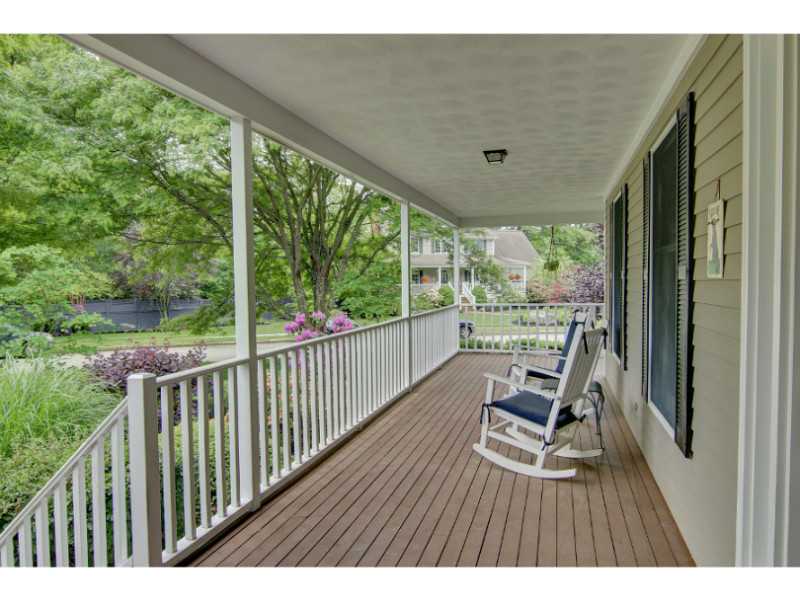 22 Great Road Barrington, RI 02806 - Photo 3 of 23 Porch. Wrap around porch overlooks corner lot placed between 2 cul d sacs