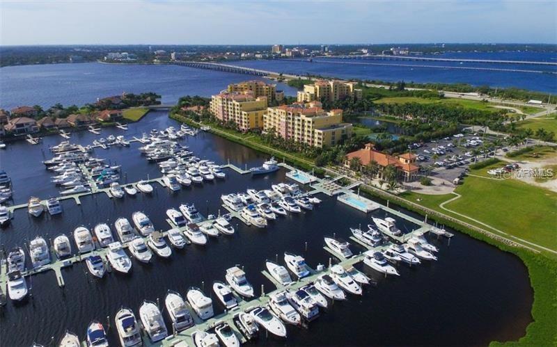 102 Riviera Dunes Way, Unit S79 Palmetto, FL 34221 - Photo 1 of 57 view of a balcony with an ocean view