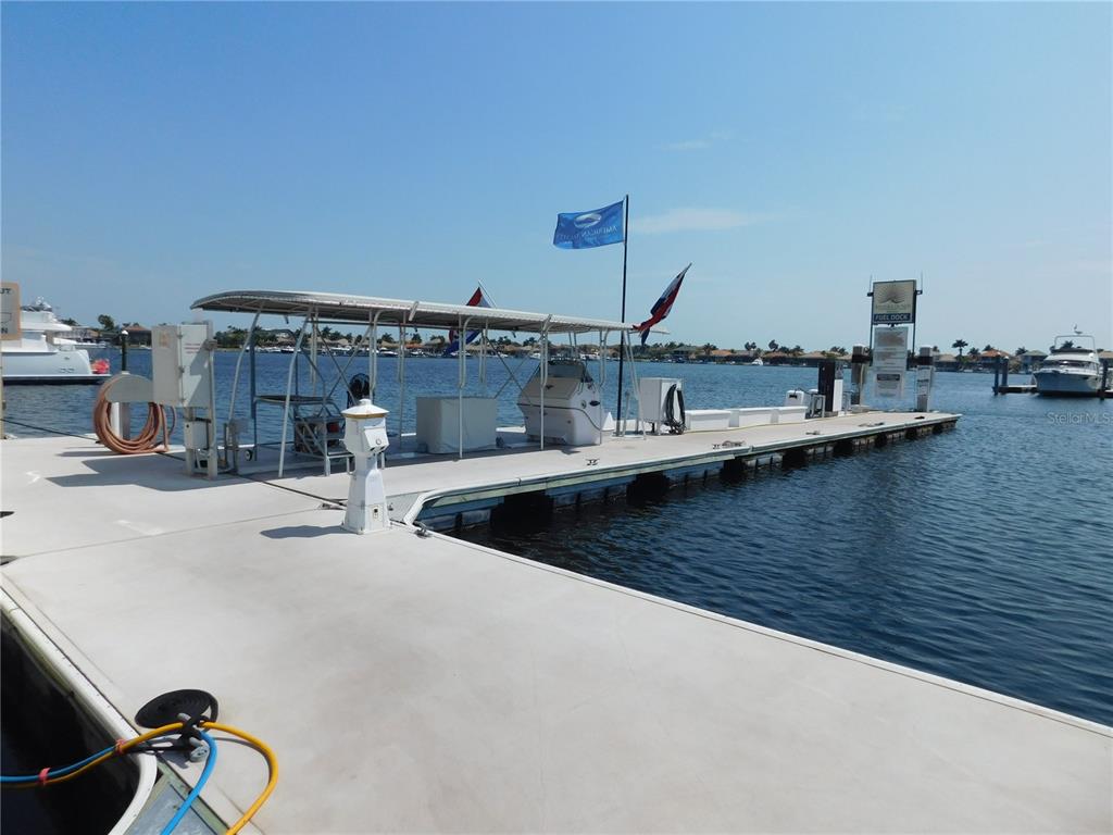 102 Riviera Dunes Way, Unit S79 Palmetto, FL 34221 - Photo 32 of 57 a view of a kitchen with a sink and a stove