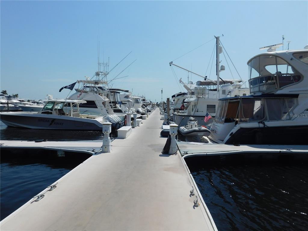 102 Riviera Dunes Way, Unit S79 Palmetto, FL 34221 - Photo 46 of 57 a view of a terrace with chairs