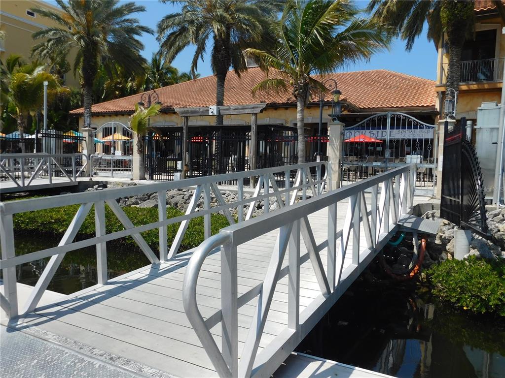 102 Riviera Dunes Way, Unit S79 Palmetto, FL 34221 - Photo 56 of 57 a view of a house with backyard and porch