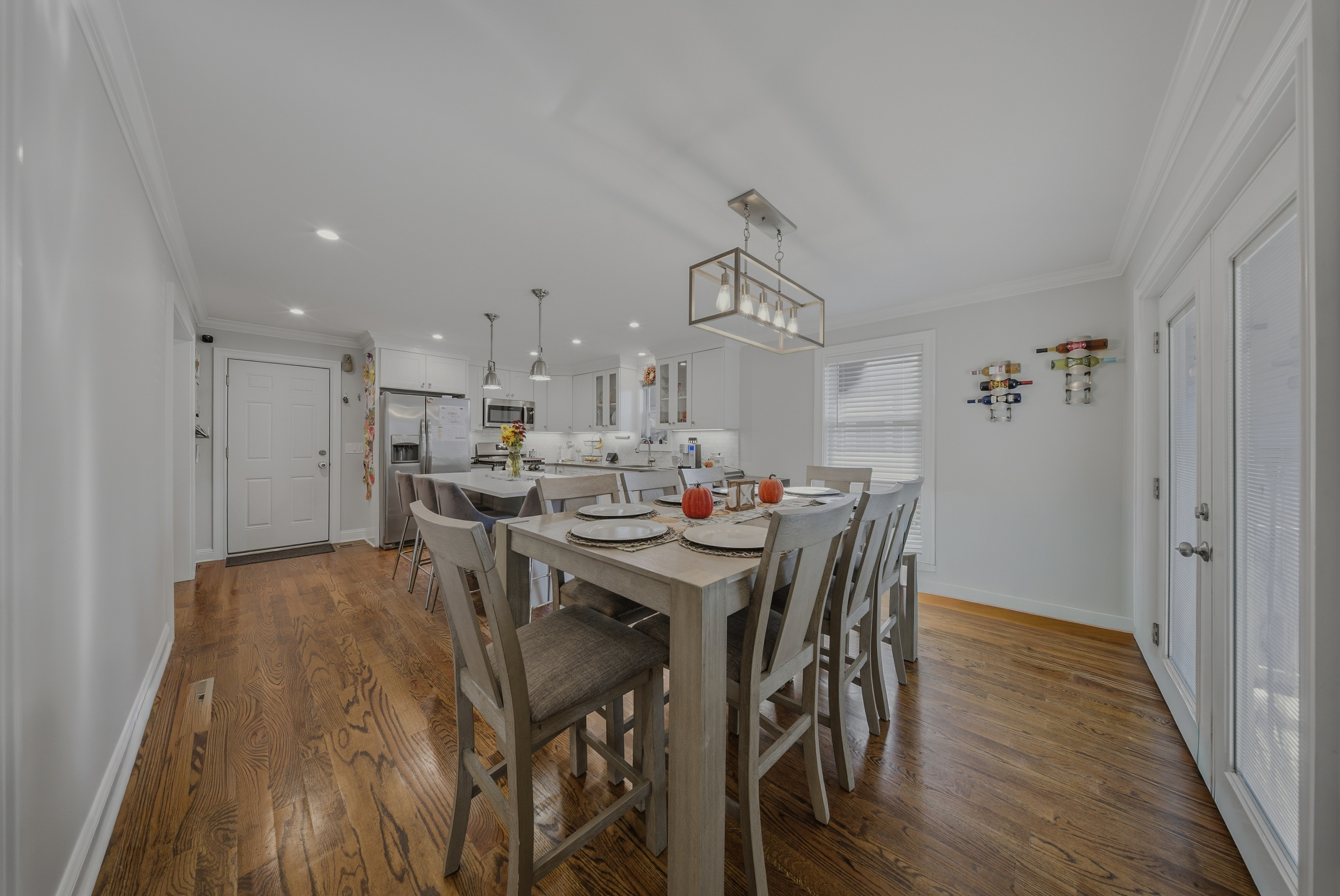 1473 Wood Avenue Bridgeport, CT 06604 - Photo 13 of 40 a view of a dining room with furniture and wooden floor