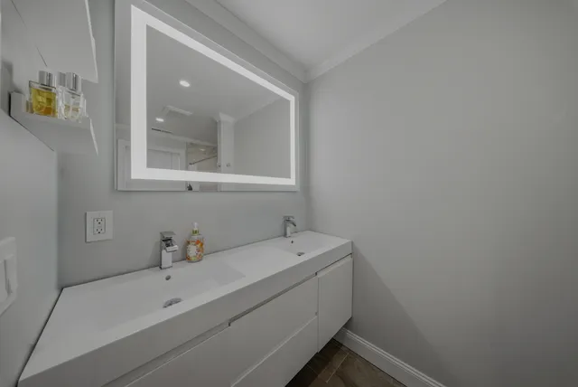 a bathroom with a sink and a bathtub