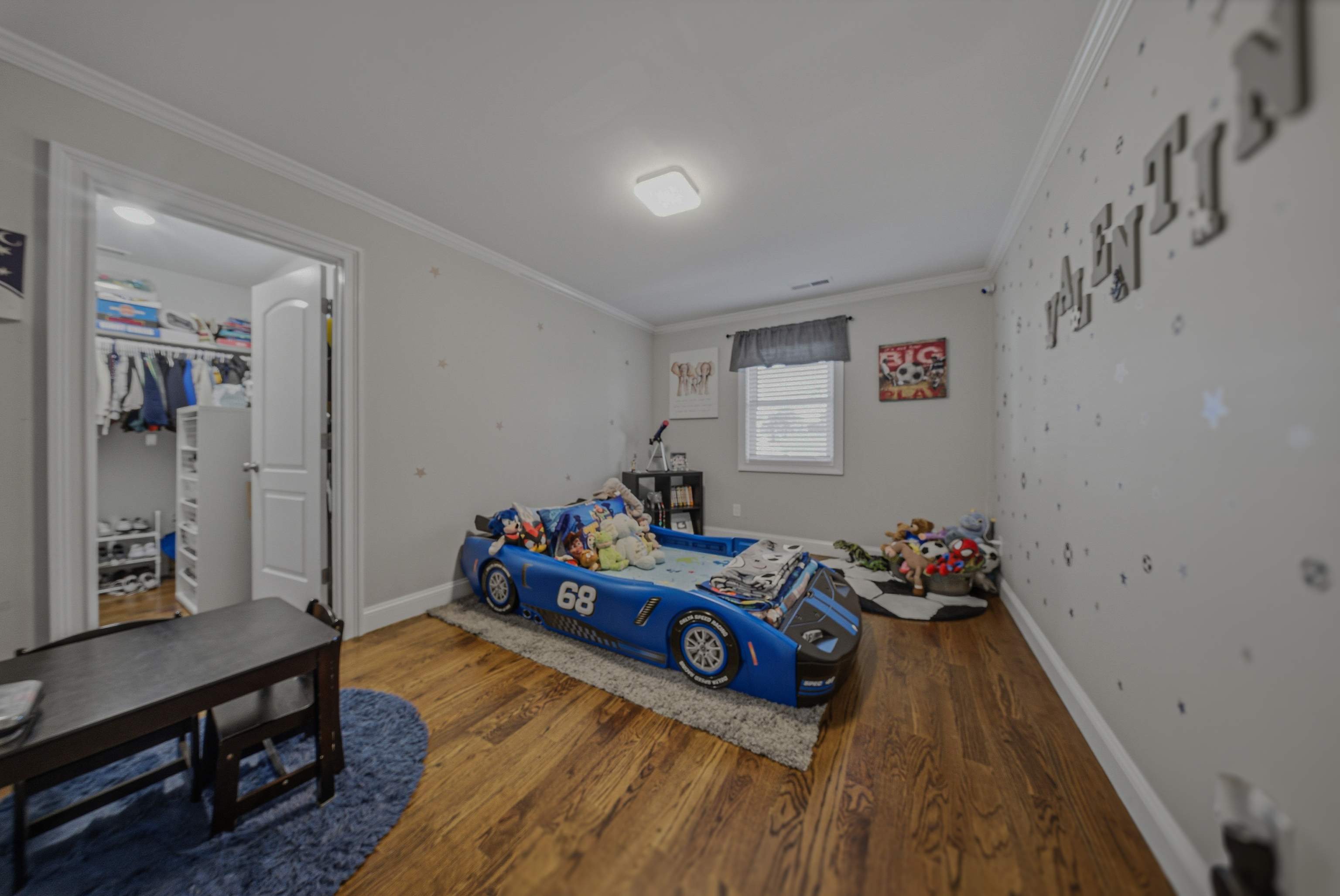 1473 Wood Avenue Bridgeport, CT 06604 - Photo 20 of 40 a bed room with furniture and a window