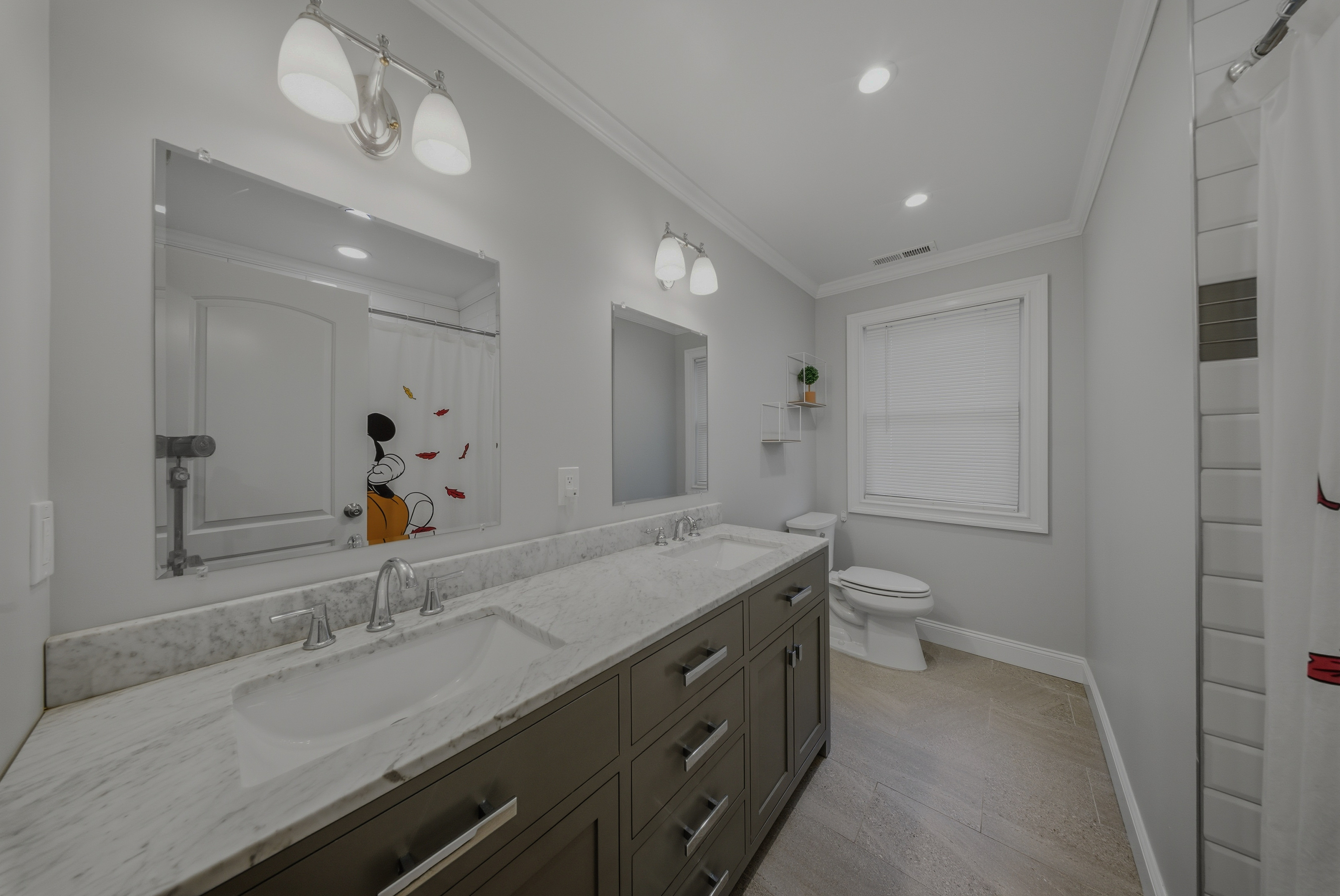 1473 Wood Avenue Bridgeport, CT 06604 - Photo 22 of 40 a bathroom with a sink and a mirror