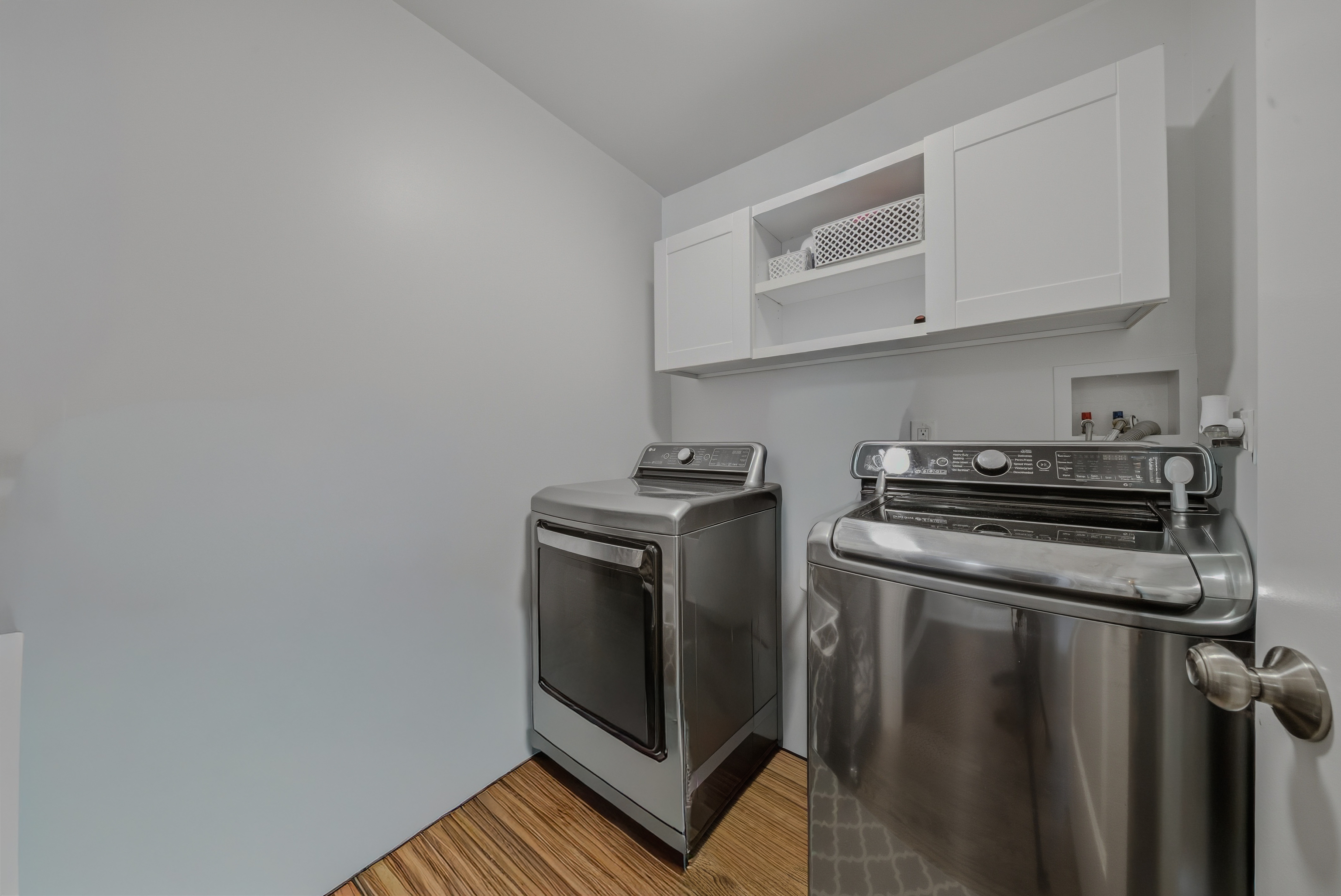 1473 Wood Avenue Bridgeport, CT 06604 - Photo 23 of 40 a view of a storage and utility room with washer and dryer