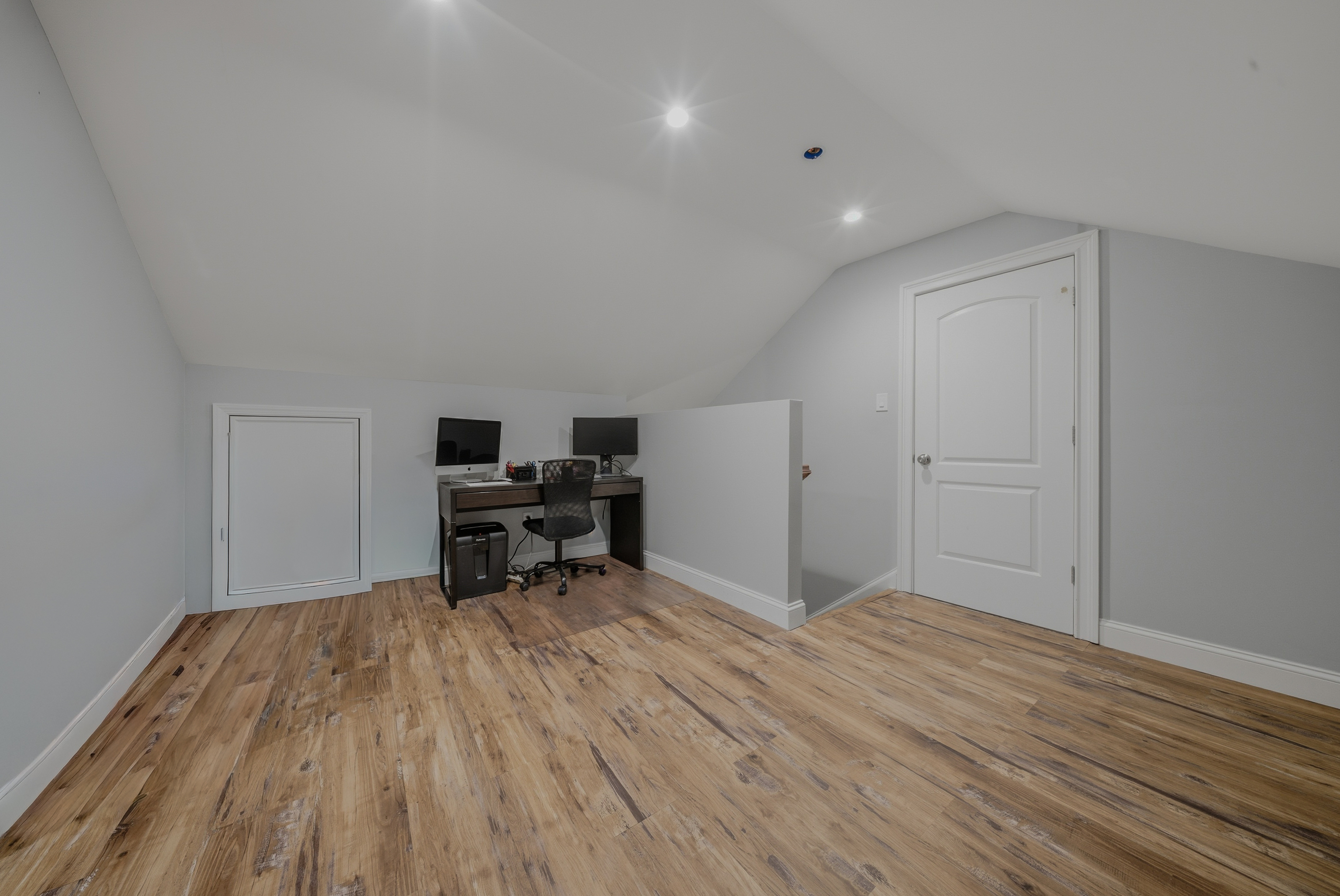 1473 Wood Avenue Bridgeport, CT 06604 - Photo 26 of 40 a view of empty room with wooden floor and furniture