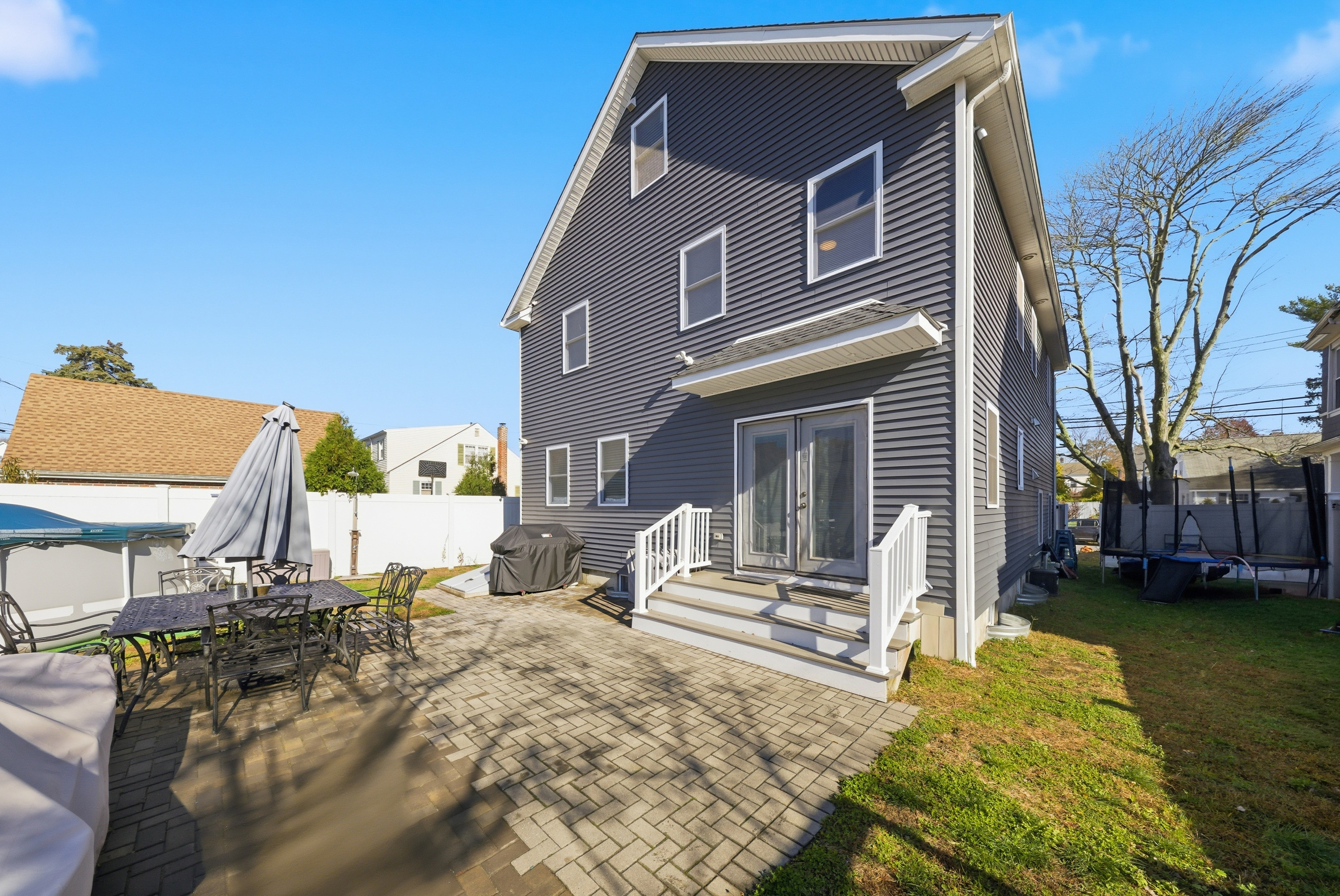 1473 Wood Avenue Bridgeport, CT 06604 - Photo 31 of 40 a front view of a house with a yard