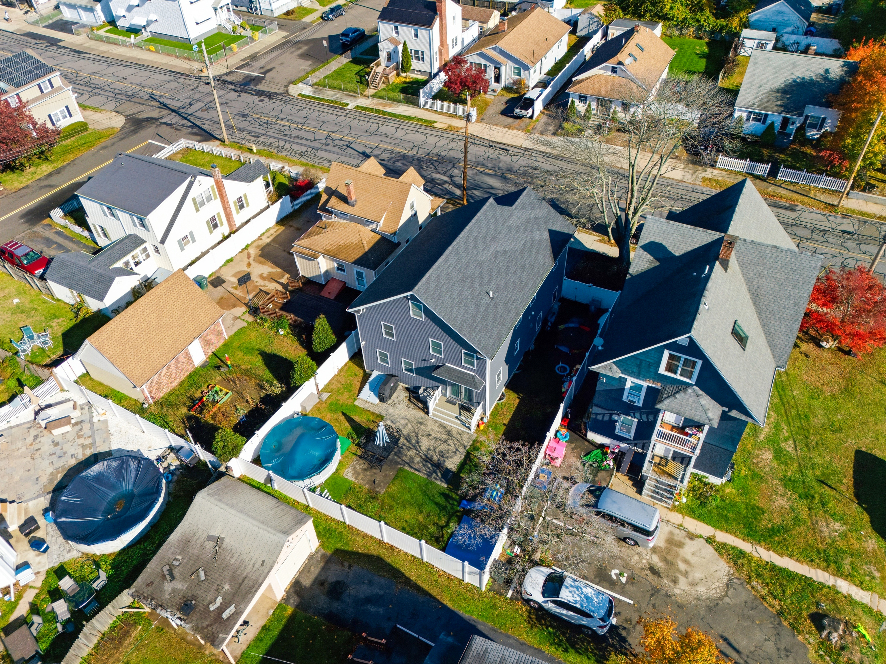 1473 Wood Avenue Bridgeport, CT 06604 - Photo 33 of 40 an aerial view of a house with a swimming pool