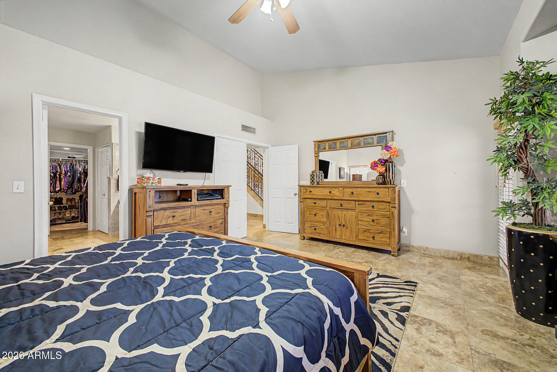 3948 North Ranier Mesa, AZ 85215 - Photo 25 of 69 a bedroom with a bed and a flat screen tv