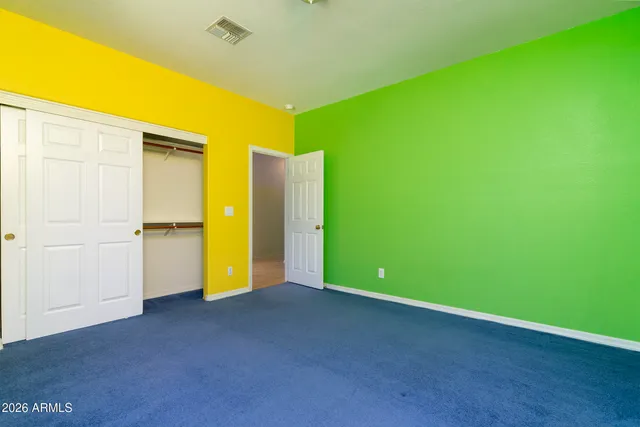 a view of a backyard with wooden floor
