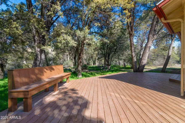 a view of a yard with tree s