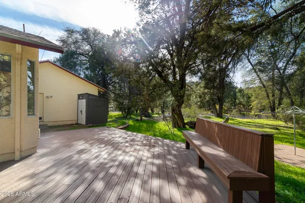 an aerial view of residential house and sandy dunes