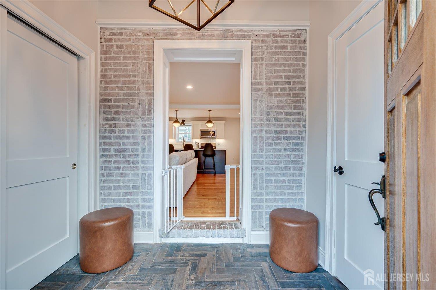 152 4th Street Edison, NJ 08837 - Photo 7 of 37 a view of living room with furniture and a potted plant
