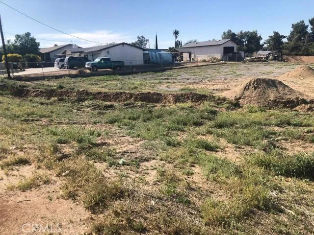 a view of a town with barn house