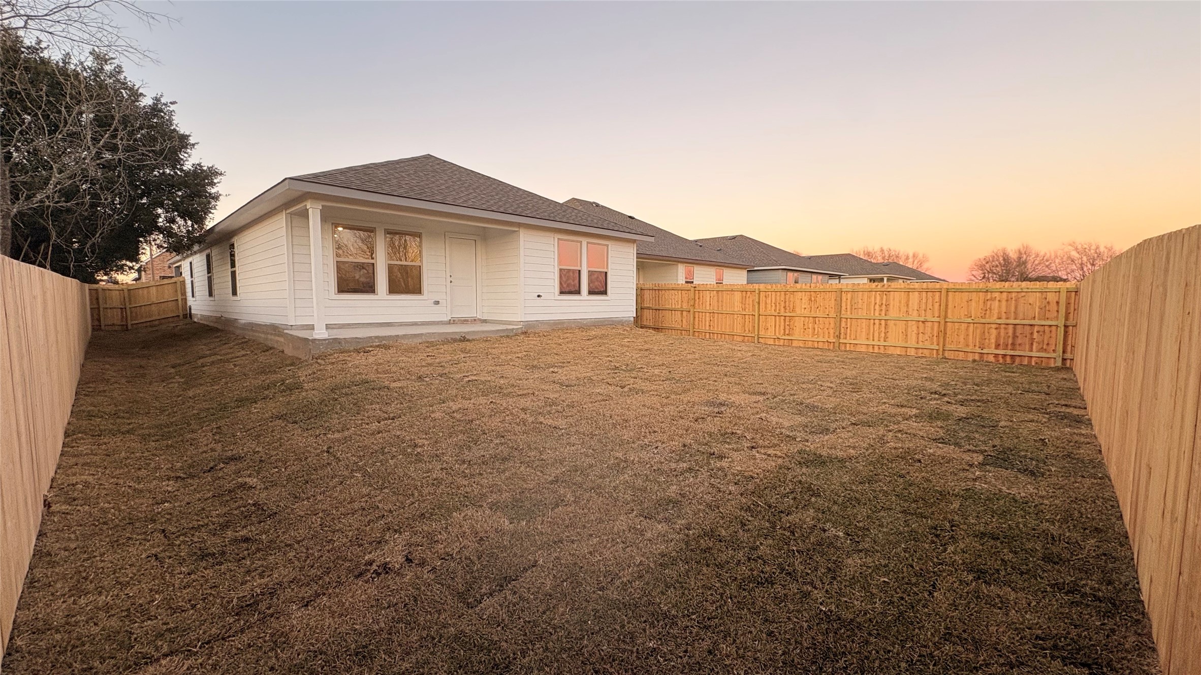 2306 White Wing Navasota, TX 77868 - Photo 6 of 6 a front view of a house with a yard