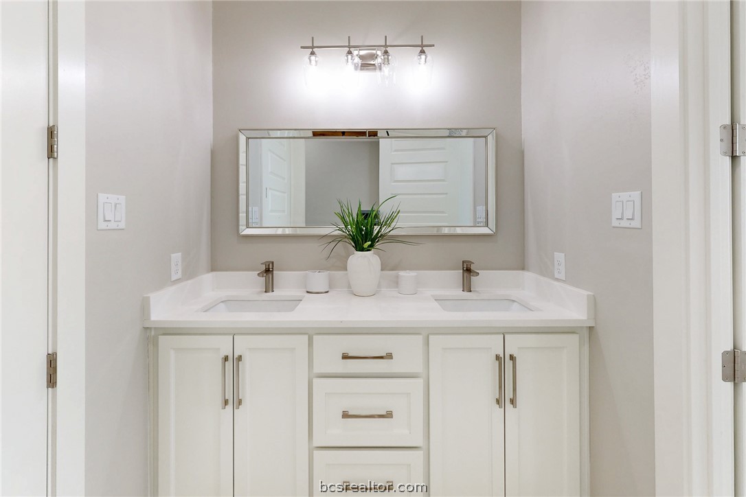 13504 Hudson Farms Road Hearne, TX 77859 - Photo 23 of 48 Lovely custom vanities in each bathroom with double undermount sinks
