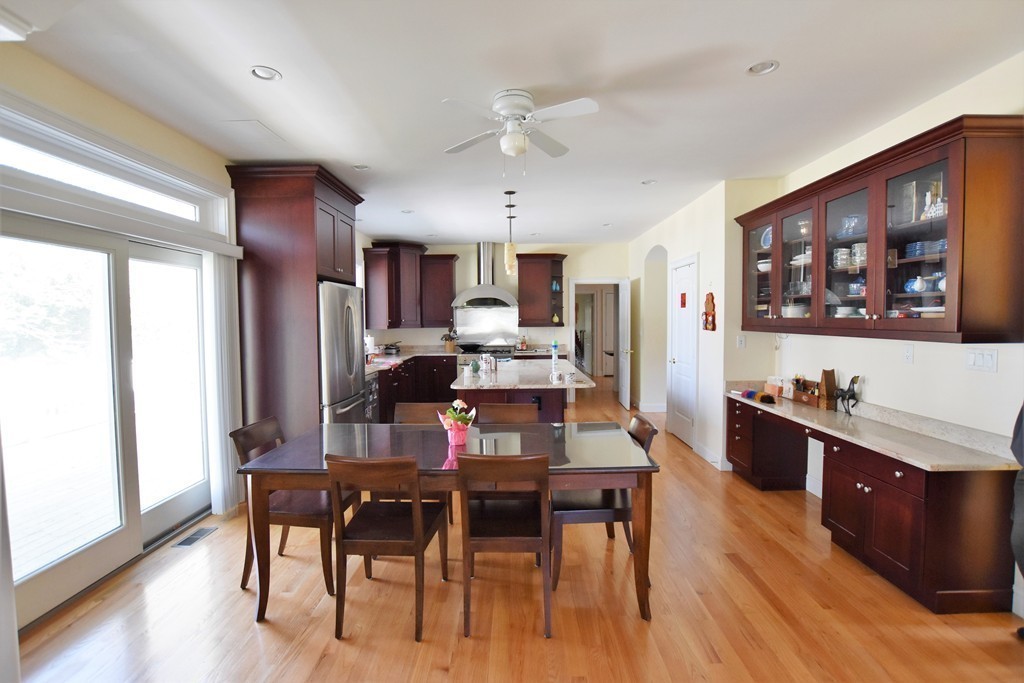 15 Augustus Road Lexington, MA 02421 - Photo 8 of 28 a view of a dining room with furniture window and wooden floor