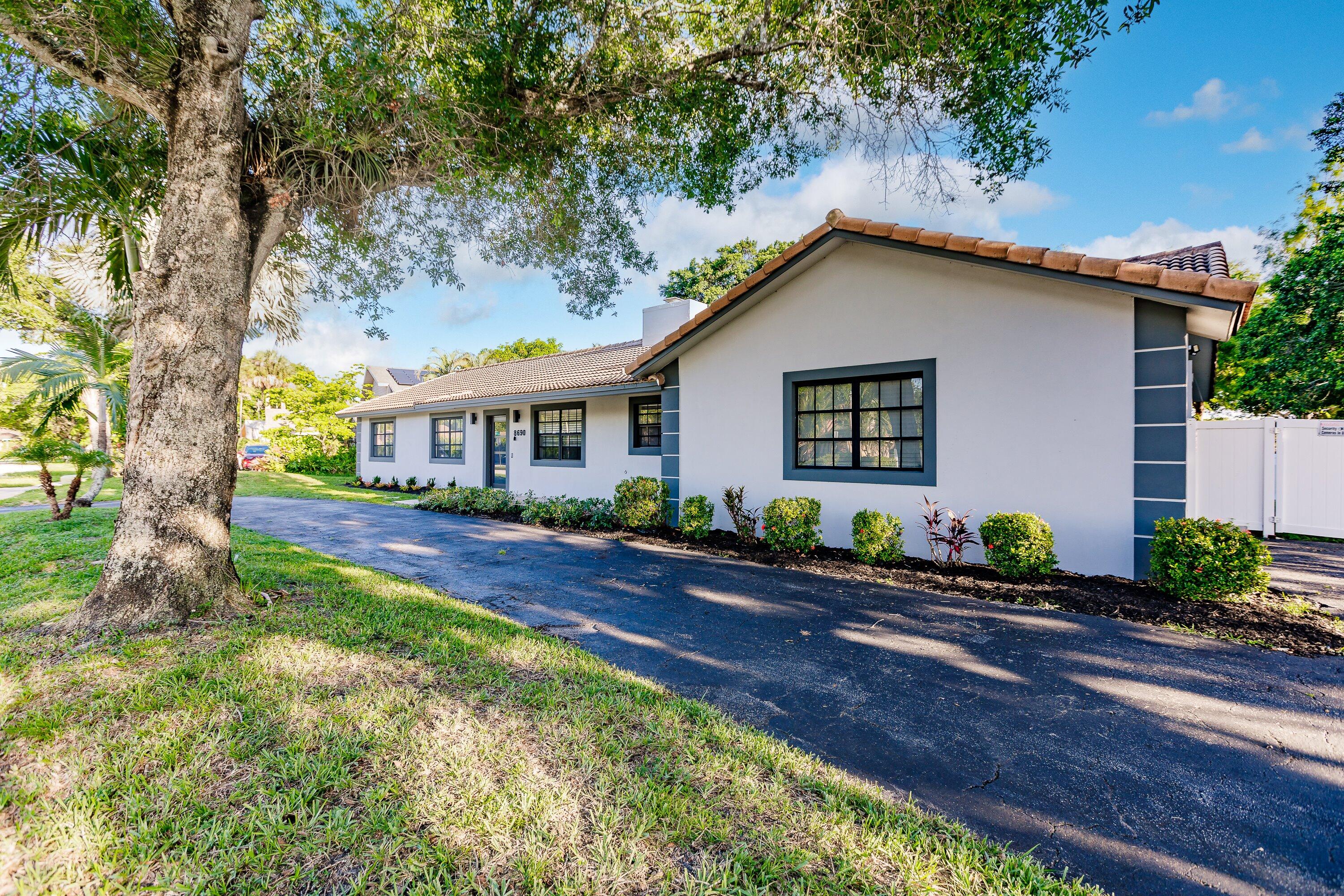 8690 Gatehouse Road Plantation, FL 33324 - Photo 3 of 56 Front Exterior