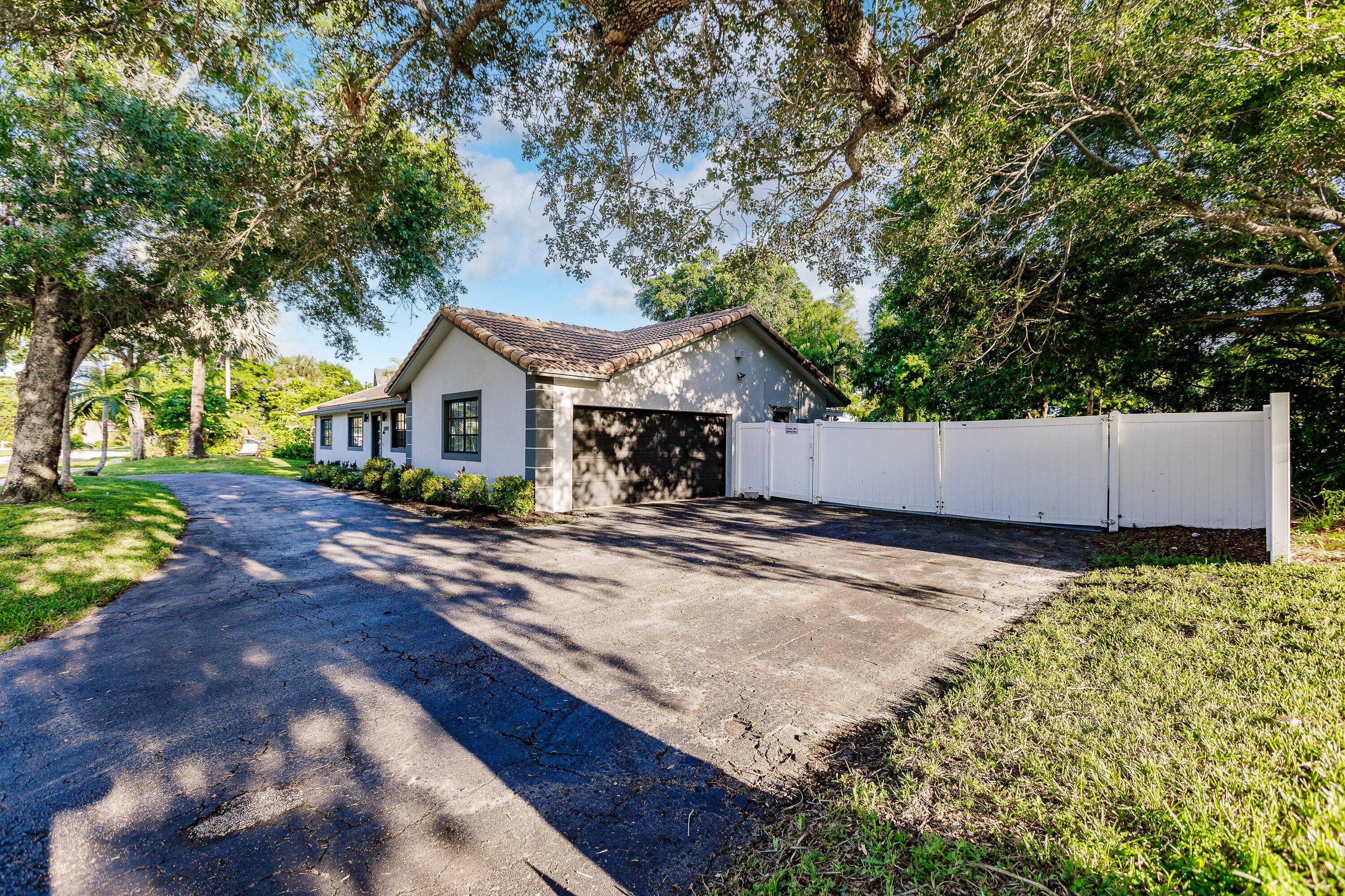 8690 Gatehouse Road Plantation, FL 33324 - Photo 4 of 56 Front Exterior