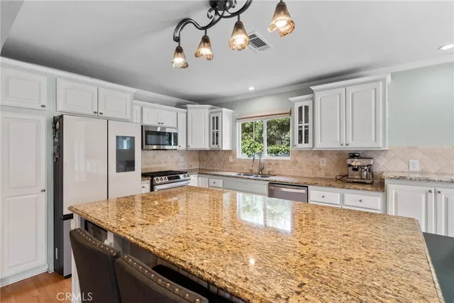 $1,274,900 | 6911 East 10th Street, Long Beach, CA 90815