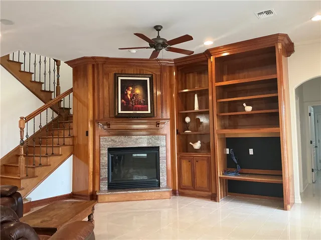 a view of livingroom with furniture and staircase