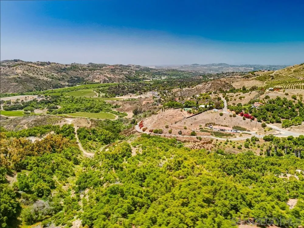 31675 Rancho Amigos Road, Unit 1 Bonsall, CA 92003 - Photo 5 of 19 a view of lake view and mountain