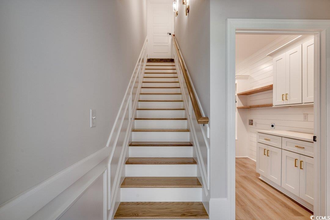 1007 Brood Court Conway, SC 29526 - Photo 25 of 40 Stairway featuring wood finished floors