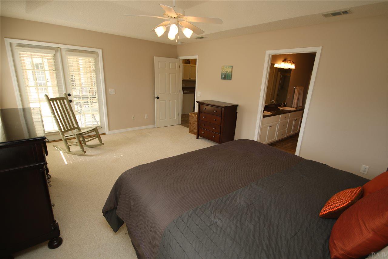 2577 Crescent Road Navarre, FL 32566 - Photo 34 of 50 French doors open to the covered patio.