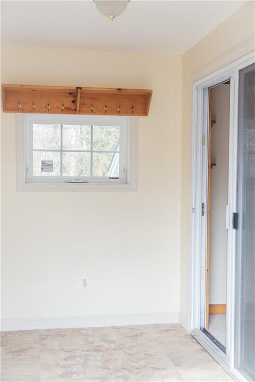 103 Long Swamp Road Lebanon, ME 04027 - Photo 13 of 24 The mudroom is handy for coat and...