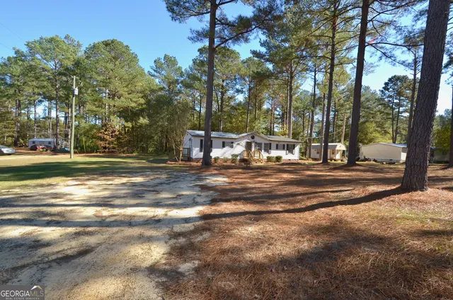 a view of a playground with basketball court