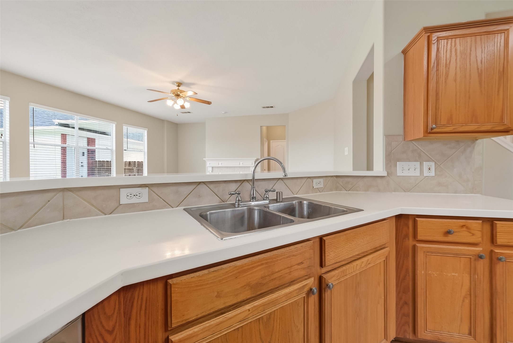 16639 Village View Trail Sugar Land, TX 77498 - Photo 16 of 50 a kitchen with a sink and a window
