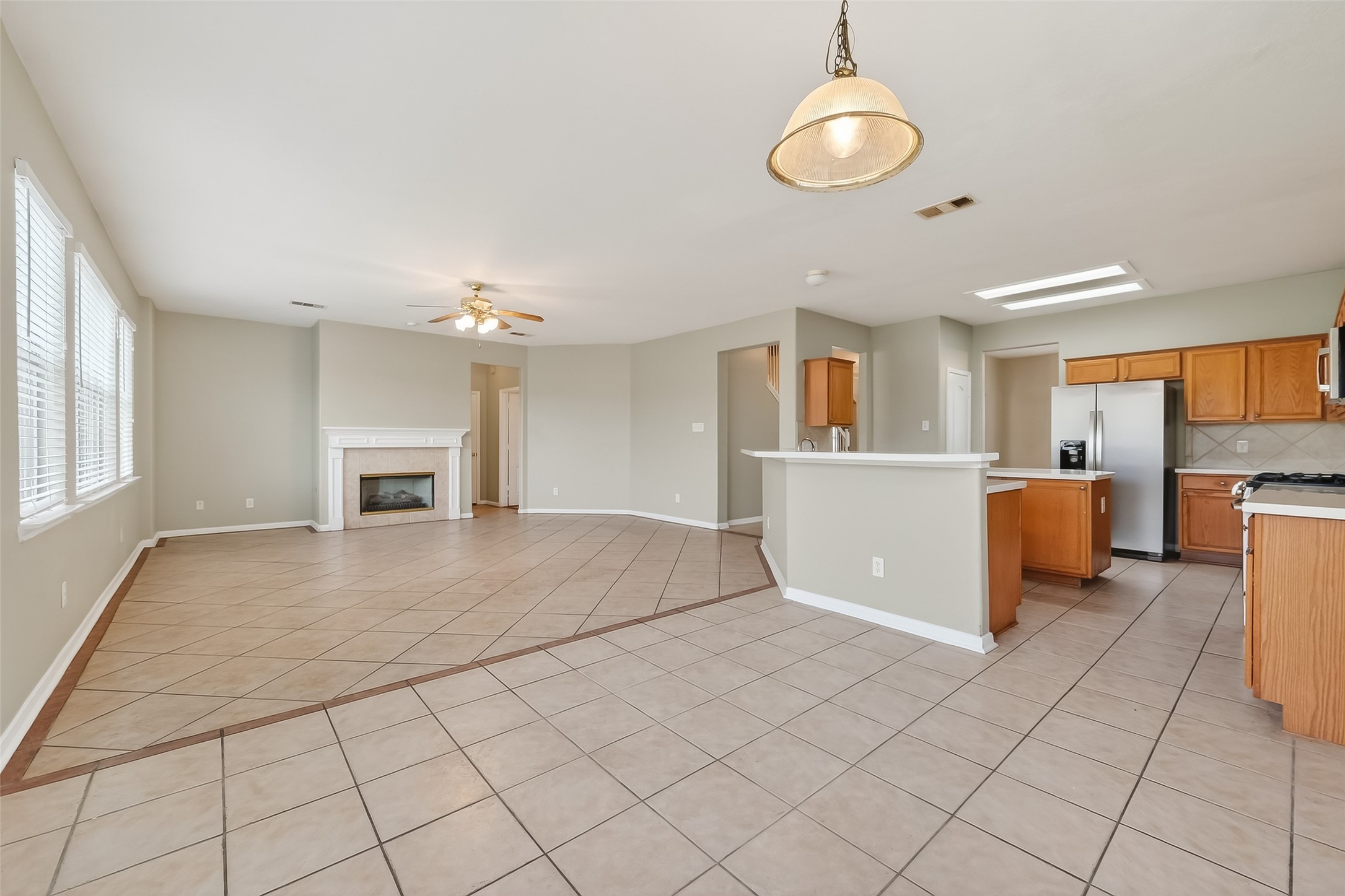 16639 Village View Trail Sugar Land, TX 77498 - Photo 18 of 50 a view of a kitchen with furniture and a kitchen