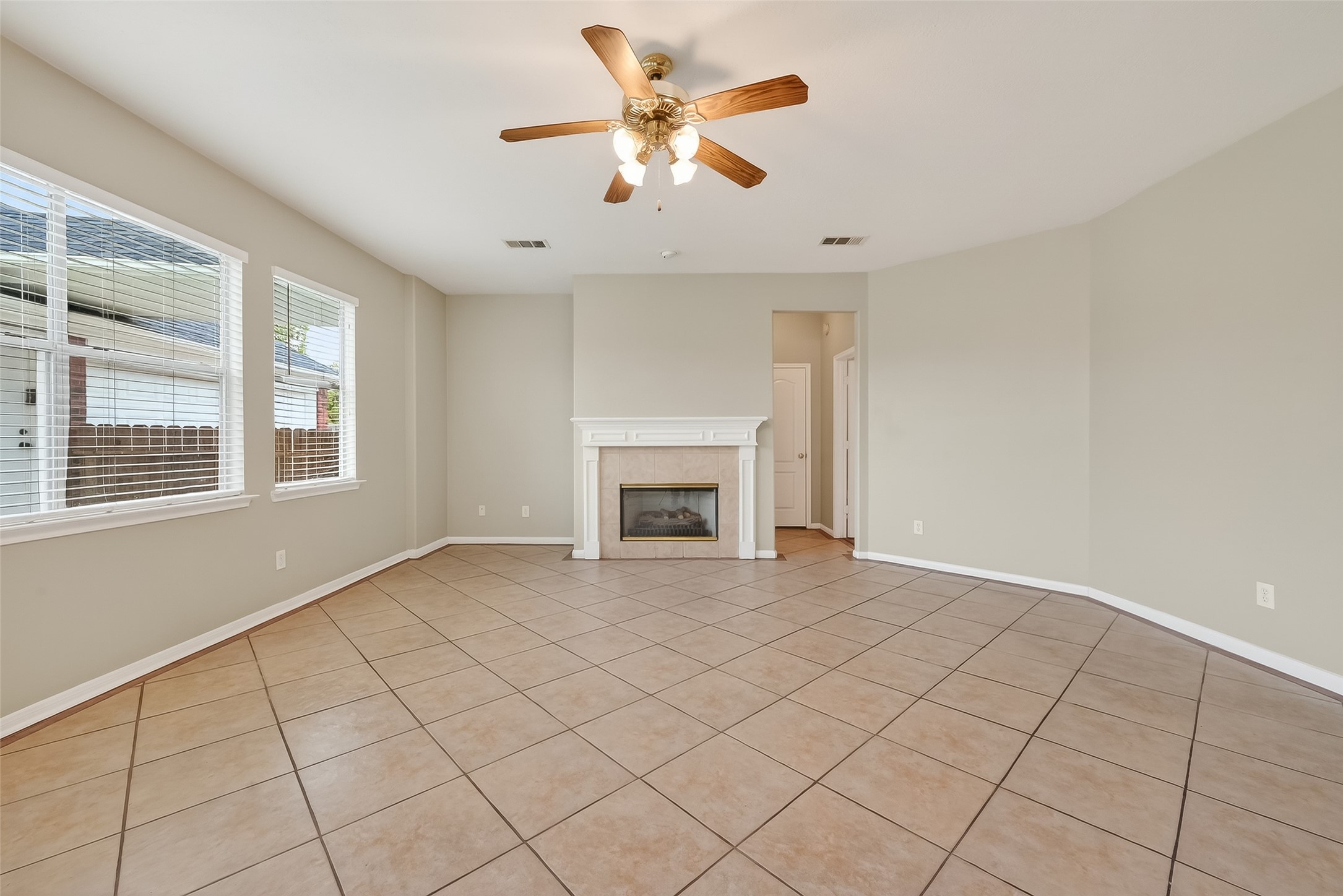 16639 Village View Trail Sugar Land, TX 77498 - Photo 21 of 50 a view of an empty room with a window