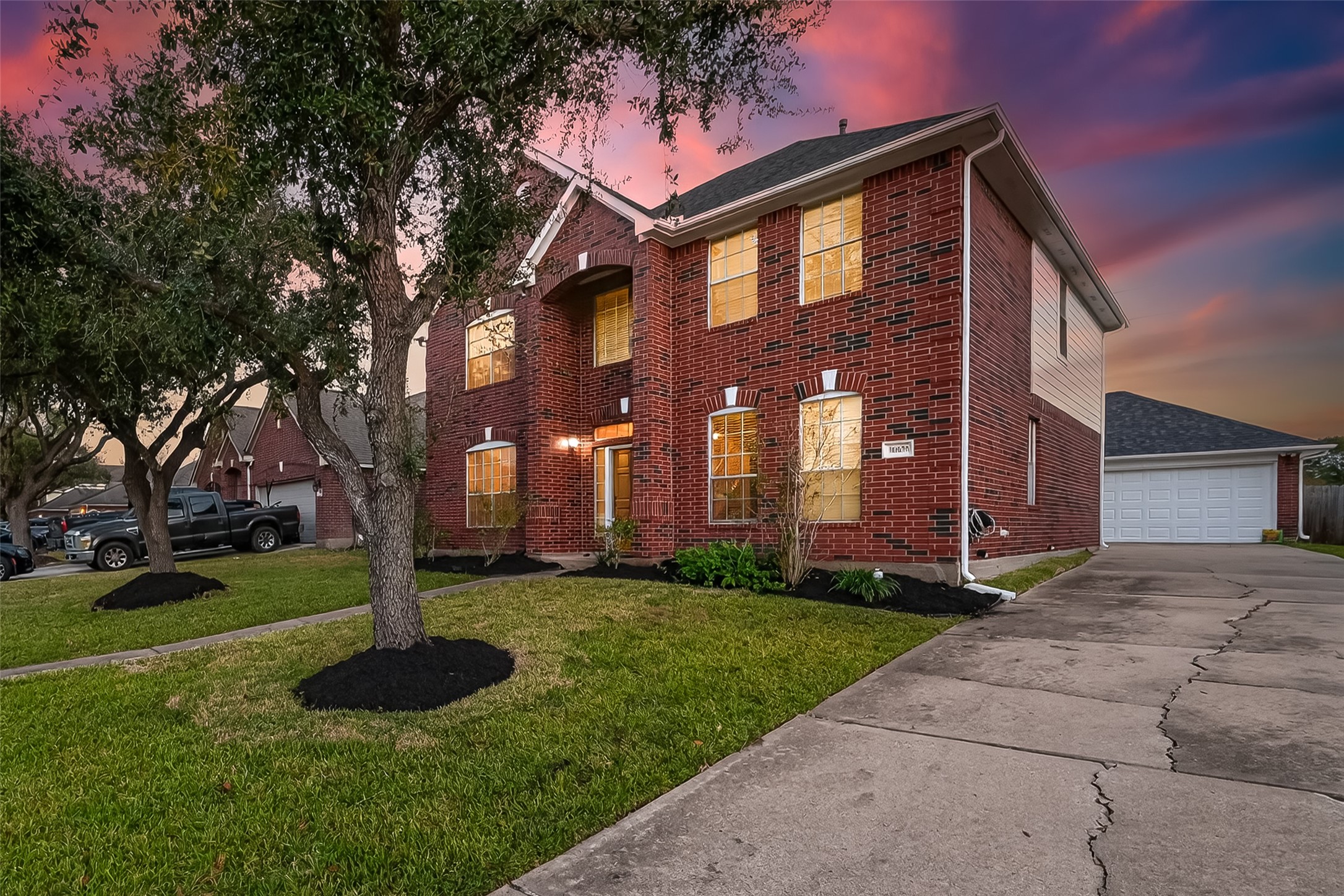 16639 Village View Trail Sugar Land, TX 77498 - Photo 3 of 50 a front view of a house with garden