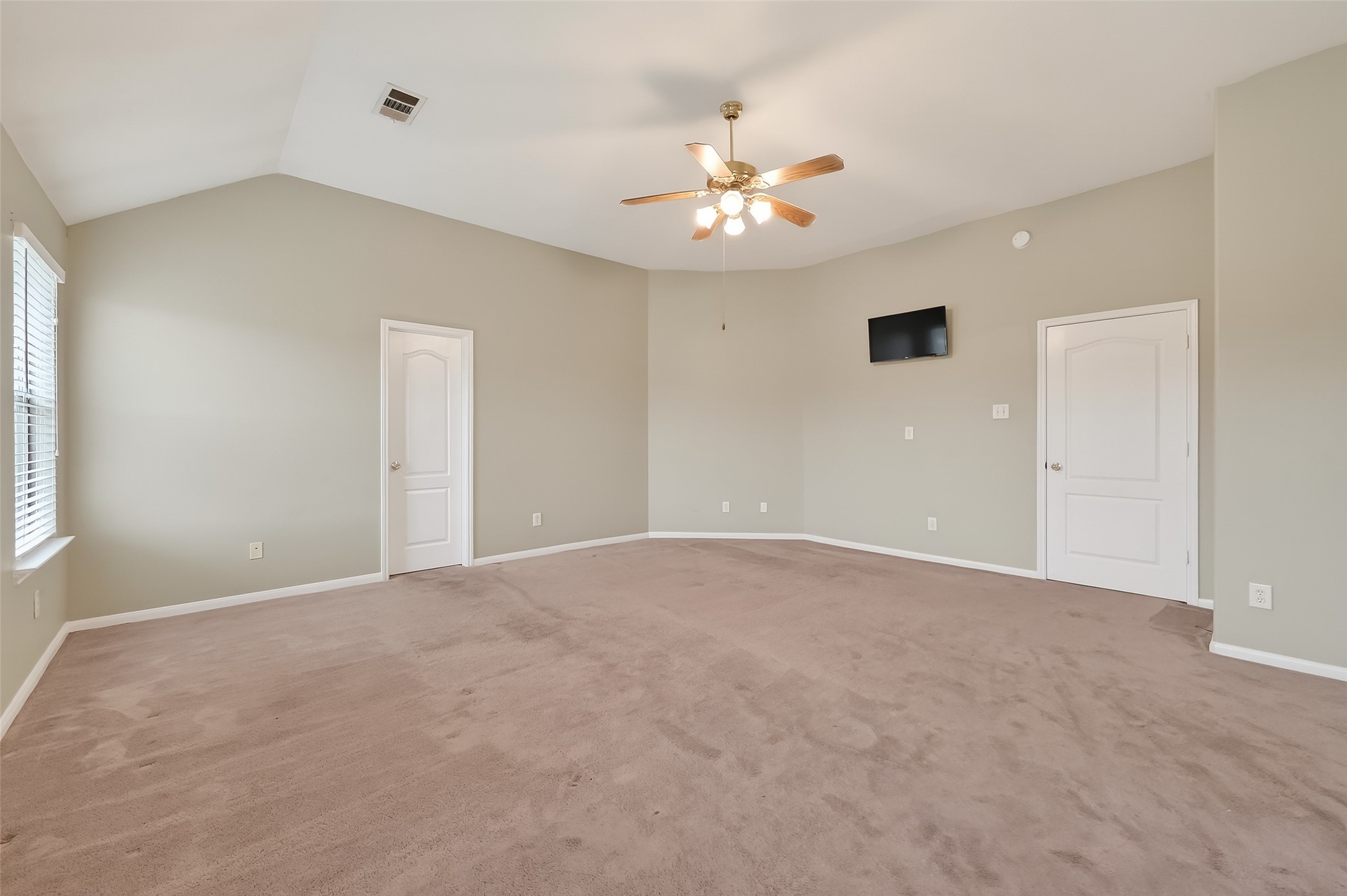 16639 Village View Trail Sugar Land, TX 77498 - Photo 36 of 50 a view of an empty room with a chandelier fan