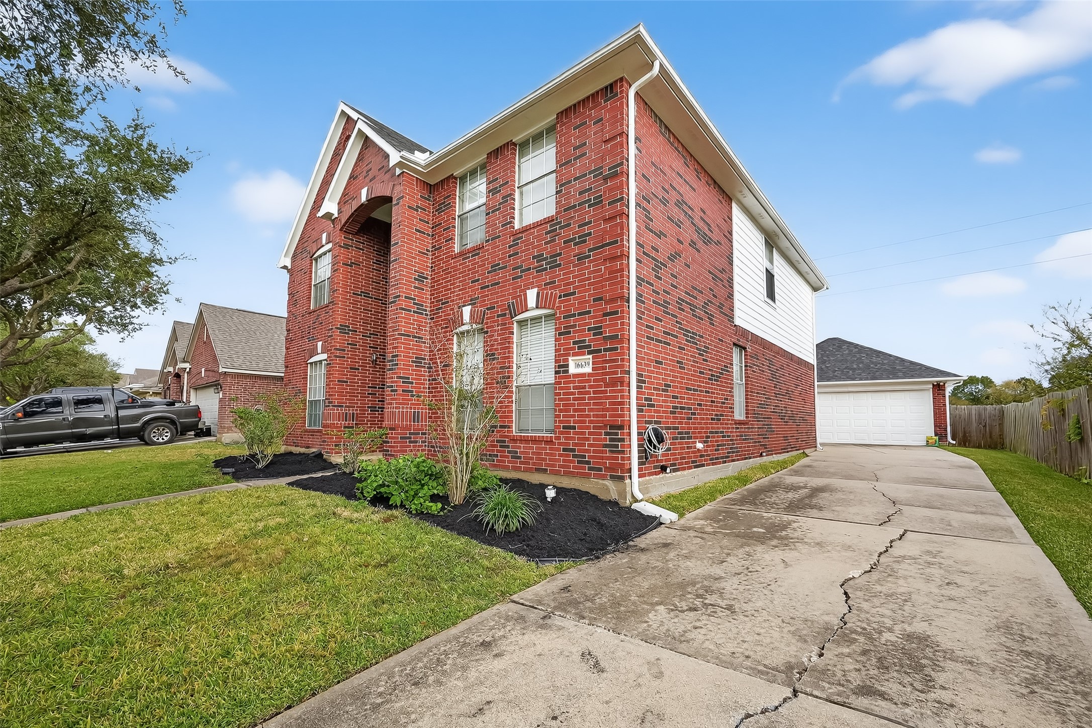 16639 Village View Trail Sugar Land, TX 77498 - Photo 8 of 50 a view of a house with a yard