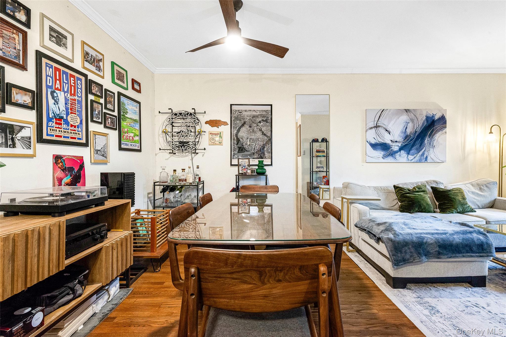 100-11 67th Road, Unit 508 Queens, NY 11375 - Photo 11 of 24 a living room with furniture and a fireplace
