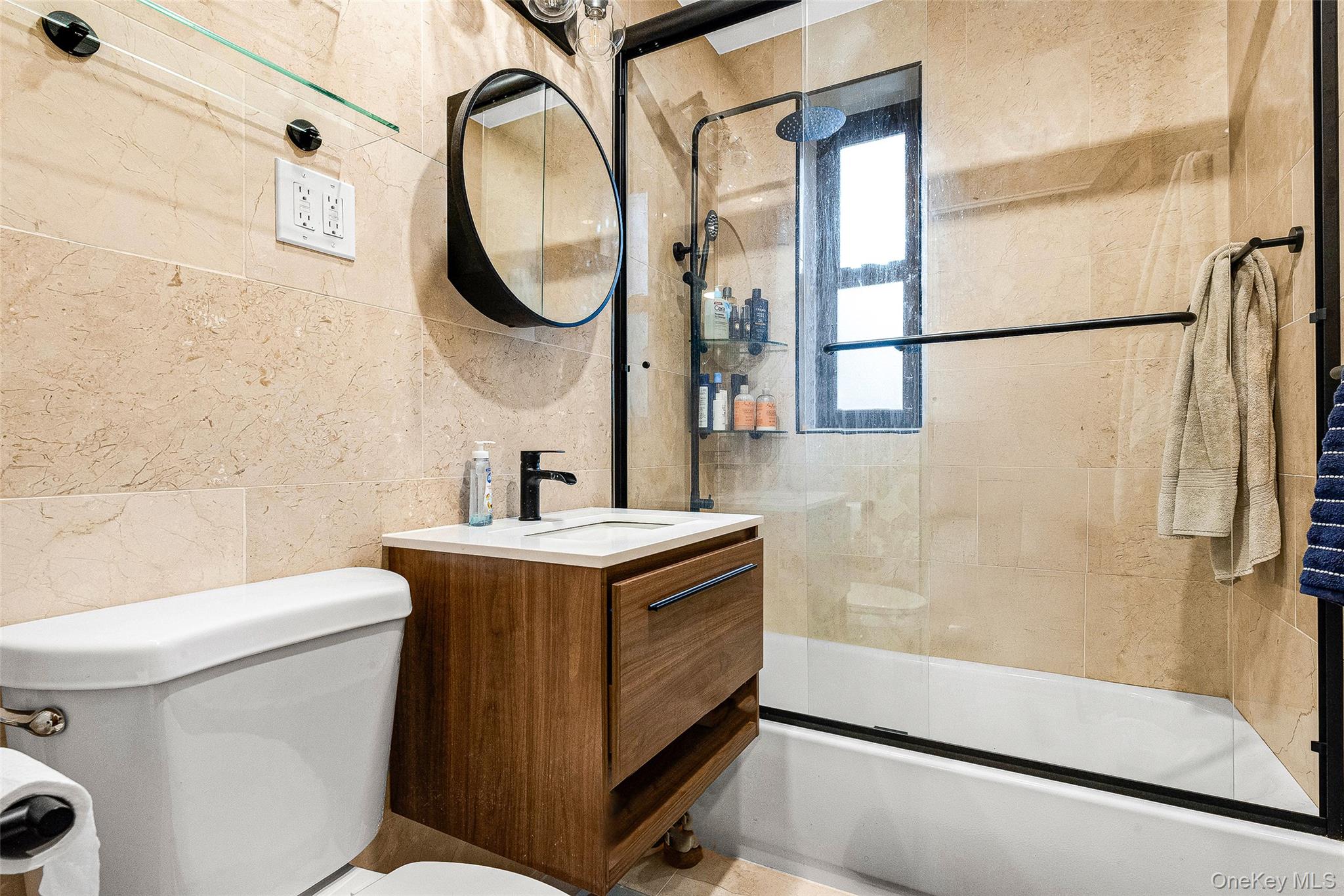 100-11 67th Road, Unit 508 Queens, NY 11375 - Photo 22 of 24 a bathroom with a sink toilet and shower