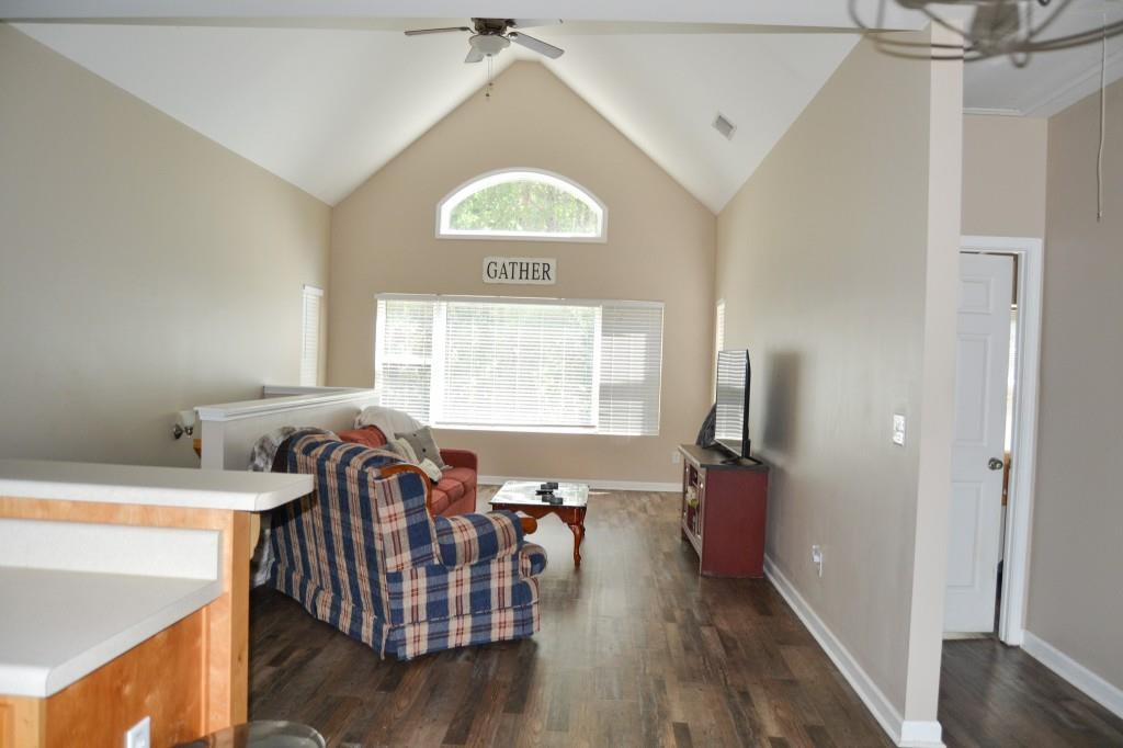 302 Pointe Circle Dahlonega, GA 30533 - Photo 2 of 19 a view of a livingroom with furniture and hardwood floor