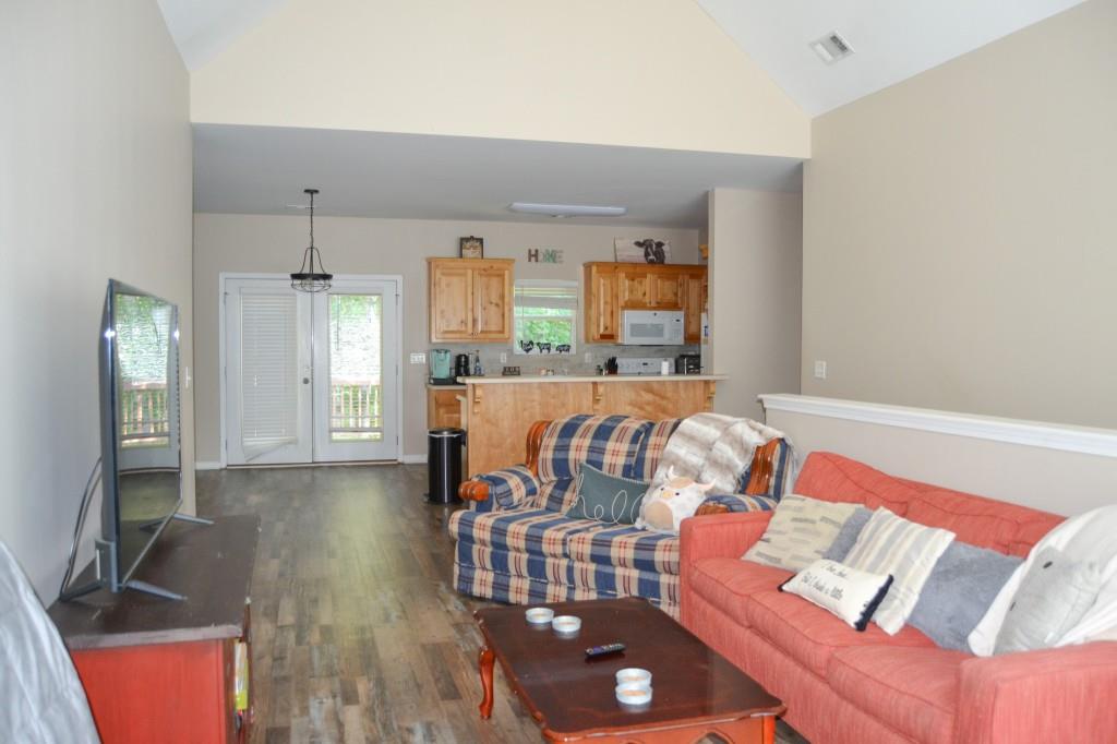 302 Pointe Circle Dahlonega, GA 30533 - Photo 5 of 19 a living room with furniture and wooden floor