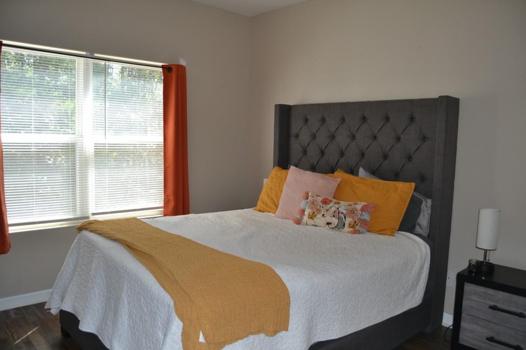 302 Pointe Circle Dahlonega, GA 30533 - Photo 6 of 19 a bedroom with a bed and window