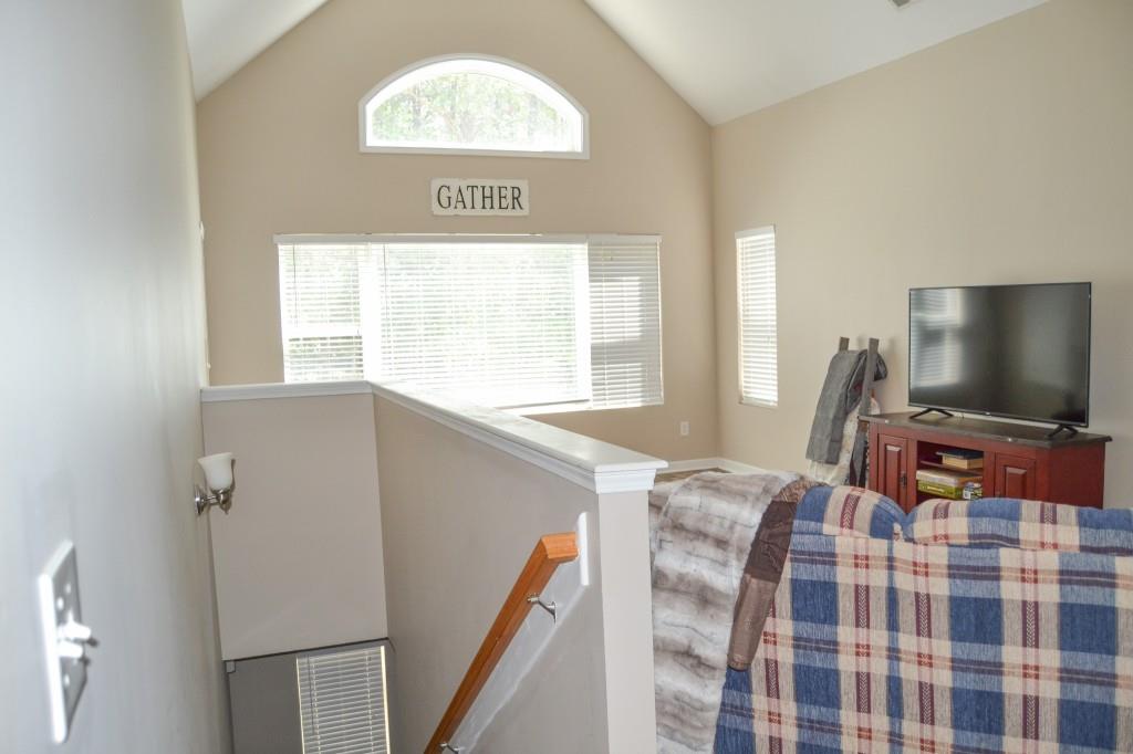 302 Pointe Circle Dahlonega, GA 30533 - Photo 7 of 19 a view of a livingroom with furniture and windows
