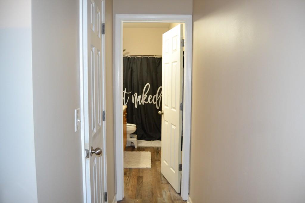 302 Pointe Circle Dahlonega, GA 30533 - Photo 10 of 19 a view of a bathroom from a hallway
