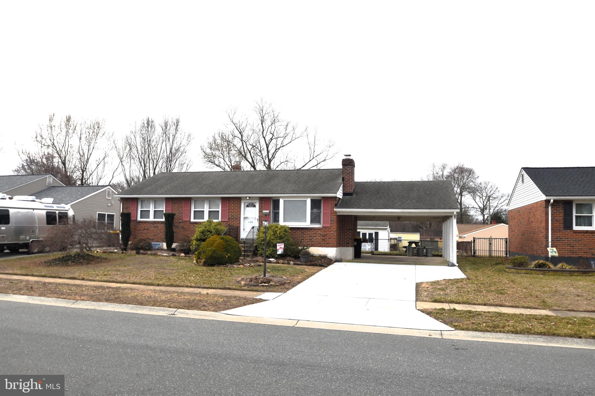 1105 Ralph Road Newark, DE 19713 - Photo 11 of 41 a front view of a house with a yard