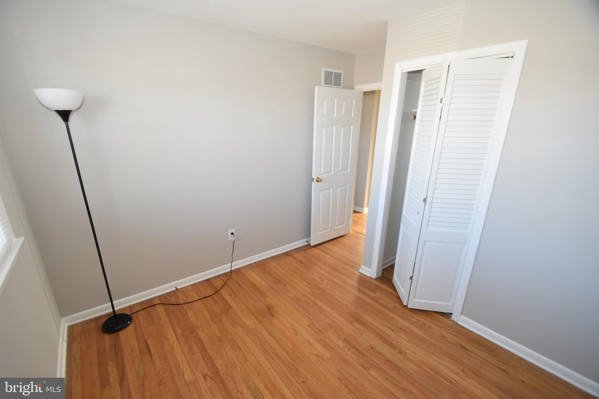 1105 Ralph Road Newark, DE 19713 - Photo 13 of 41 a view of an empty room with wooden floor
