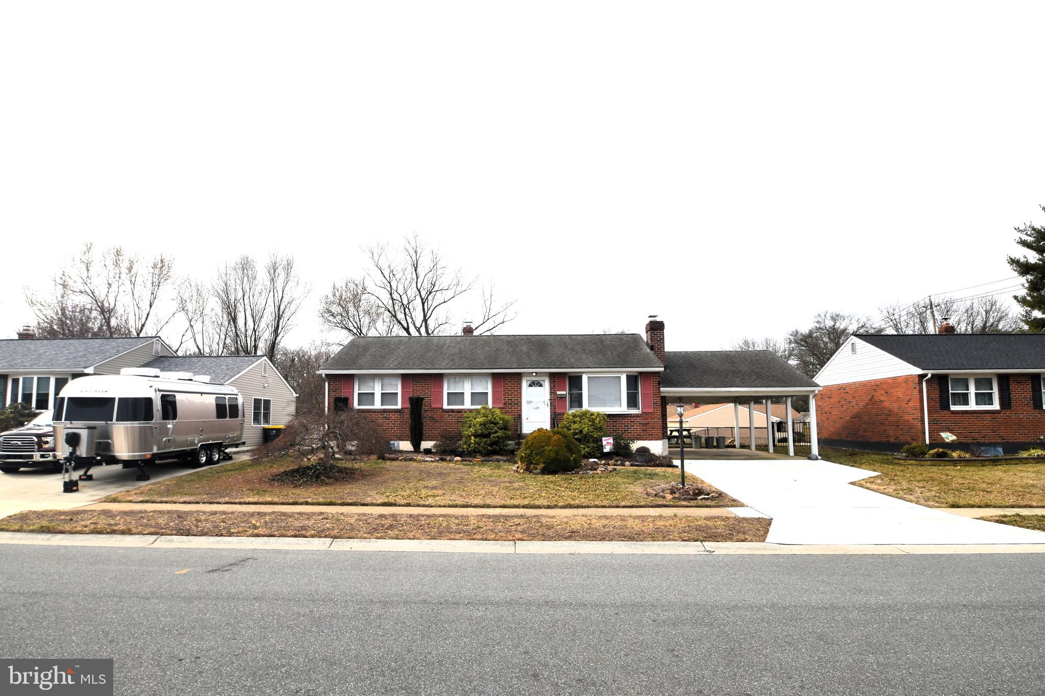 1105 Ralph Road Newark, DE 19713 - Photo 21 of 41 a front view of a house with a yard