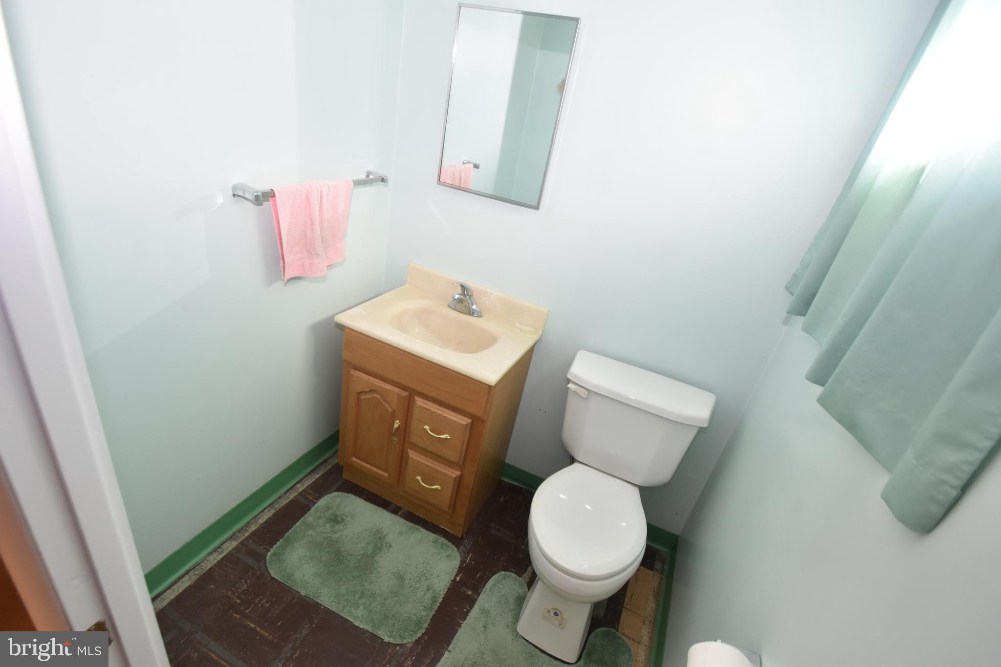 1105 Ralph Road Newark, DE 19713 - Photo 24 of 41 a bathroom with a toilet and a sink